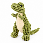 Green plush dinosaur dog toy with textured fabric and cream-colored belly on a clean white background.