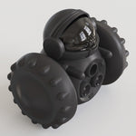 Petlivate black interactive treat dispensing toy featuring textured rolling wheels, a transparent lid and multiple treat openings.